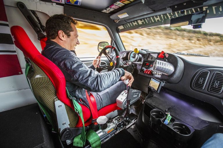 Sam Smith racing in a van